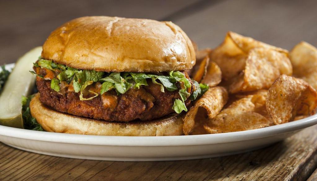 Buffalo Chicken Sandwich · A hand-breaded and fried chicken breast tossed in your favorite wing sauce and served with your choice of ranch or blue cheese.