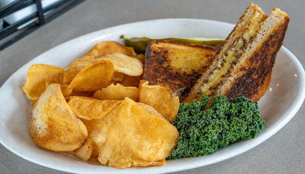 Mom'S Grilled Cheese · Texas toast smothered in butter, melted American cheese, and maternal love. Thanks Mom.