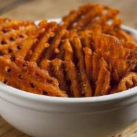 Sweet Potato Fries · Waffle cut and tossed in cinnamon and sugar.