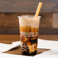 Black Sugar Trifecta · Comes with tapioca, flan, and grass jelly.