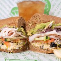 Turkish Delite · Avocado, Turkey, Cucumbers, Tomatoes, Onions, Mushrooms, Sprouts, Olives, with Hummus Or Cre...