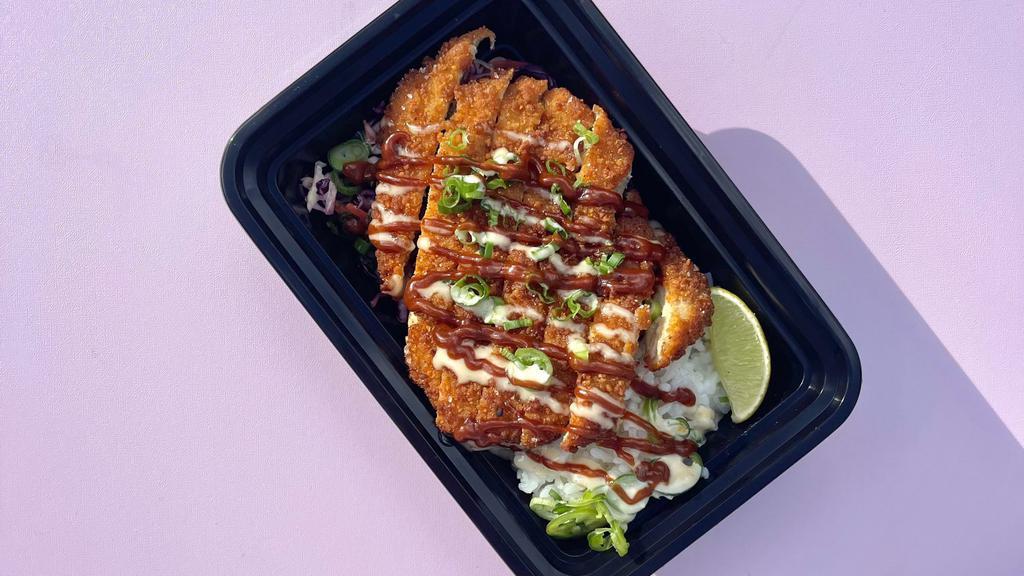 Fried Chick'N Katsu Box · Crispy Chick'n Filet silced over a Bed of Slaw and Short Grain Rice served with Tonkatsu Sauce and Aioli. (Everything is always vegan!)