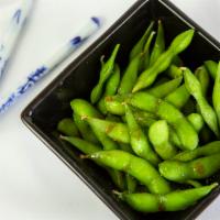 Edamame · Boiled and lightly salted green soy beans.