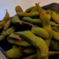 Fried Green Beans · Lightly fried with a onion battered fresh green beans .