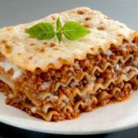 Lasagna · Layered with meat and mozzarella, ricotta and parmesan cheese.
