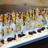 Tsunami Roll · Spicy crab, deep-fried shrimp, cream cheese topped with, deep-fried albacore tuna, avocado, ...