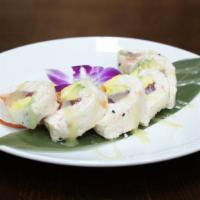 Wasabi Roll · Crab, salmon, tuna, mango, avocado, with green soy paper.