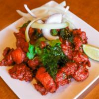 Chicken - 65 · Chef special fried chicken sautéed with green chilies and spicy red sauce with yogurt.