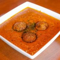 Malai Kofta · Potato dumplings made with veggies, cheese and cashew nuts cooked in delicious creamy gravy