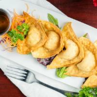 Crab Rangoon (5) · Crabmeat and cream cheese, celery, onion, carrots, minced wrapped in wonton sheet, served wi...