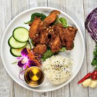 Chicken Wings · Delicious marinated wings served with choice of homemade sweet and sour sauce, teriyaki sauc...