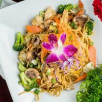 Lomein · Served with egg, carrots, cabbage, mushroom, and broccoli.