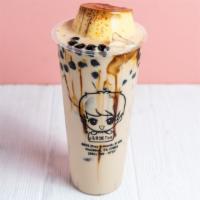 Ulike Milk Tea · Milk tea with black sugar boba, flan. Add extra topping for an additional charge.