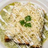 Crispy Taquitos (4) · Topped with green tomatillo sauce, sour cream, and Monterrey Jack cheese.