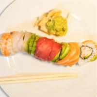 Rainbow Roll · Crabmeat, avocado and cucumber topped with tuna, salmon, shrimp, white tuna, and avocado.