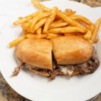 Philly Cheesesteak · It's a classic! Thinly sliced steak or chicken topped with golden sauteed onions and melted ...