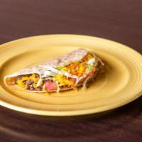 Crispy Taco · Picadillo or shredded chicken.
