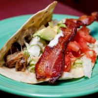 Chicken Ranch Taco · Grilled chicken fajitas, lettuce, ranch dressing, tomato, avocado, melted Monterey jack chee...