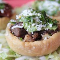 Chicken Al Carbon · Our own homestyle sope with refried, beans Monterey jack cheese, guacamole, charbroiled chic...