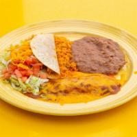 Combination Plate · One cheese enchilada and a crispy taco. Served with homemade flour tortillas, refried beans,...