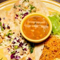 Fish Taco Plate (3) · Panko breaded or grilled wild-caught cod. Served on corn tortilla, covered with a mild savor...