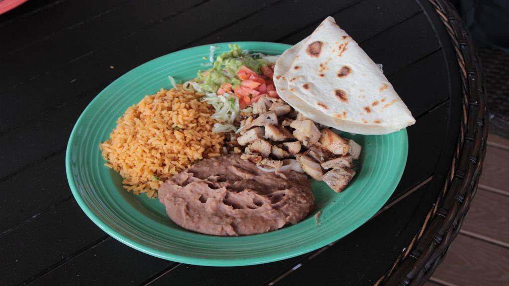 Chicken Fajita Plate · Served with guacamole, grilled onions and pico de gallo. Served with homemade flour tortillas, refried beans, and rice or sub beans and rice for the side of vegetables (combo of mushrooms, tomatoes, onions, zucchini, and yellow squash).