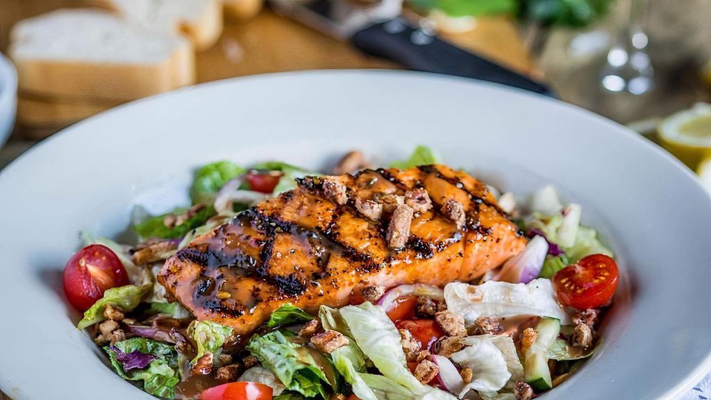 Hurricane Glazed Salmon Salad · Greens, red onion, tomato, cucumber, pecans, with choice of dressing. Topped with our Hurricane Glazed Salmon.