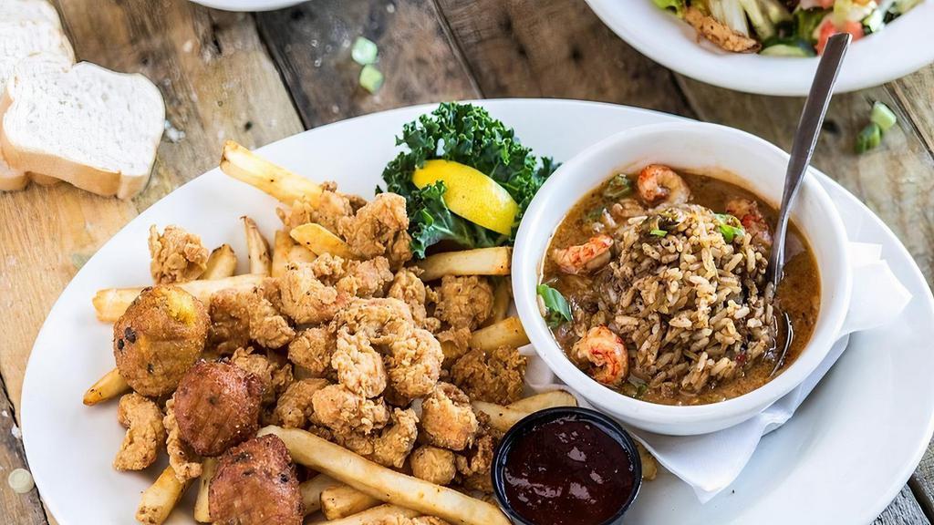 Cajun 2-Ways · Choice of crispy shrimp or crawfish tails with etoufee and dirty rice.