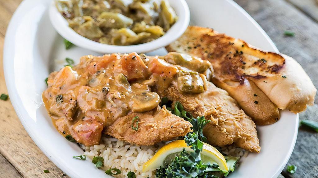 Fish Ah Yee! · Flaky fried white fish smothered in a savory shrimp cream sauce.