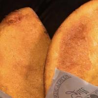 Empanada De Queso Con Papa · Filled with cheese and mashed potatoes
