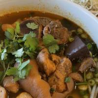 Bun Bo Hue · Spicy beef noodle soup with pork.