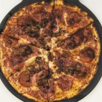 Carnivore Pizza · All the meats. Pepperoni, salami, smoked bacon, and house-made pork sausage atop marinara, m...
