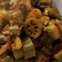 Okra Masala · Sliced okra, pan grilled and tossed with spices.