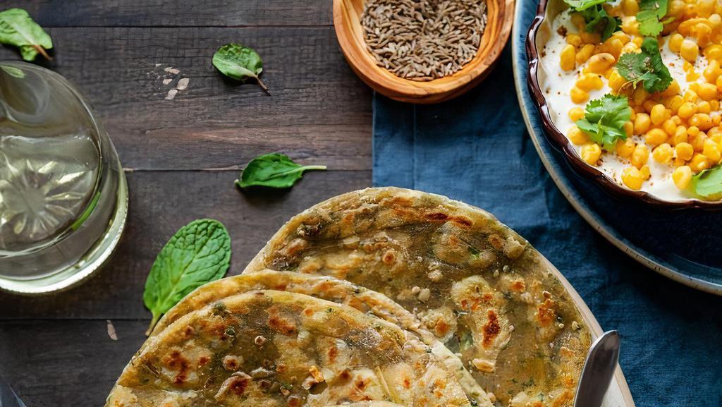 Mint Paratha Mint [Vegan] · Whole wheat bread with mint and baked to perfection.