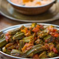 Bhindi Masala Masti[Vegan] · Fresh okra sauteed with onions, garlic and tomatoes.