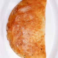 Meatball Calzone · Meatballs floating in melted mozzarella cheese inside a crispy, calzone!