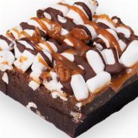 Rocky Road Brownie · Brownies with marshmallows and drizzled in caramel and chocolate syrup.