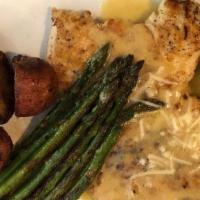 Chicken Piccata · pan seared chicken breast with lemon caper beurre blanc.  served with garlic mashed potatoes...