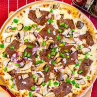 Philly Steak Pizza · american cheese, steak, green pepper, onion, mushroom