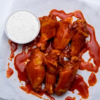 Wings · Served with Blue Cheese or Ranch dressing. 14 flavors to choose from.