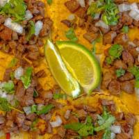 Taquiza De Asada · 5 Small Corn Tortillas, Carne Asada, Onions & Cilantro
