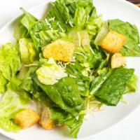 Caesar Salad · Fresh romaine tossed with our Caesar dressing topped with croutons and parmesan cheese.