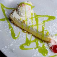 Key Lime Cheesecake · The classic key lime pie blended with cheesecake for added richness and smoothness with a sw...