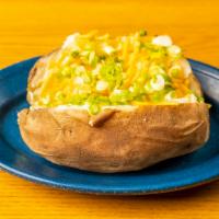 Big Potato · Large Idaho potato stuffed with your choice of butter, sour cream, chives and cheese
