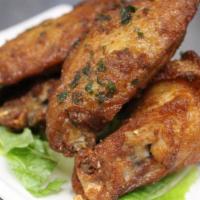 Chicken Wings · Wings, Marinated and fried to a crisp. Choose from 3 Flavors: Salt/Pepper/Basil, Lemon Peppe...