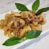 Fried Calamari · This Freshly Fried Squid is sure to please. If you enjoy a classic appetizer with a little P...