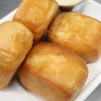 Fried Buns · Fried Bao Buns, served with Condensed Milk. This appetizer is perfect for those who are crav...