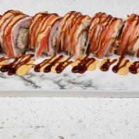 Shaggy Dog Roll · Crab meat on top of a shrimp tempura roll, topped with sweet eel sauce and spicy mayo.