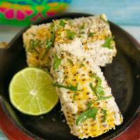 Mexican Corn  · Grilled (3 half cobs) and topped with garlic mayonnaise, cotija cheese, seasoning and cilant...