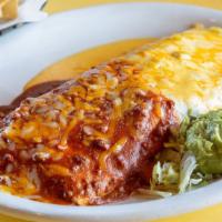 Texas Burrito · It’s a giant Texas-sized burrito filled with seasoned beef, refried beans, rice, lettuce, to...